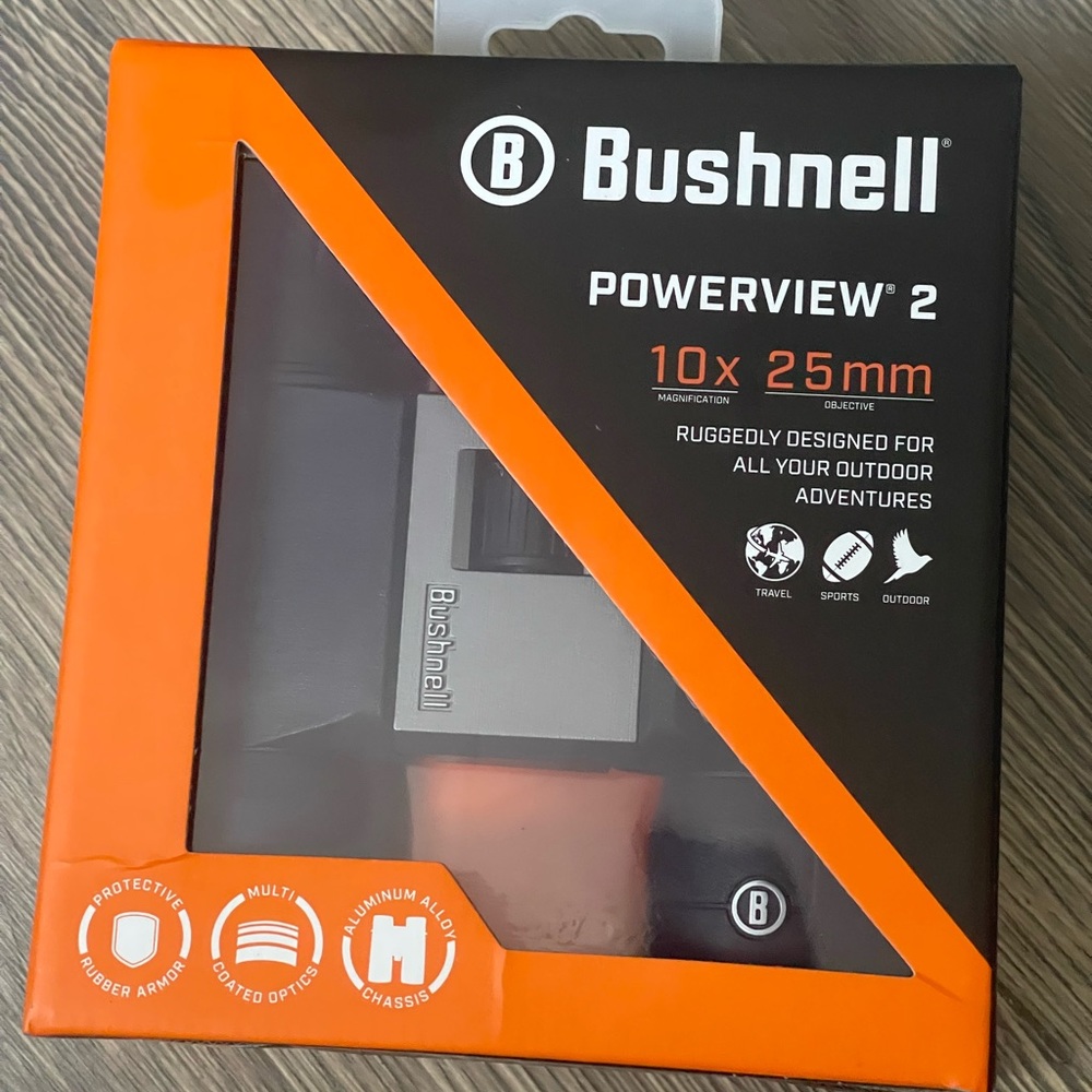 Brand new binoculars. Bushnell. Great for football , baseball & other invents.